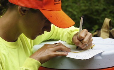 image of a woman writing
