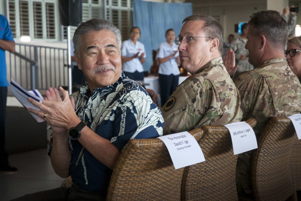 David Ige, Hawaii State Governor, applauds members of the Hawaii Air National Guard Feb. 10, 2019, at Joint Base Pearl Harbor-Hickam during the 2018 Launa’ole Awards ceremony. The ceremony has been held for 43 years and was officially renamed to Launa’ole in 2001, meaning “beyond comparison” or “without peer.” (U.S. Air National Guard photo by Senior Airman John Linzmeier)