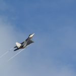An F-22 Raptor climbs after take-off from the flightline Nov. 24, 2014, at Andersen Air Force Base, Guam. A C-17 Globemaster III along with several F-22s operated from Andersen to practice flexibility in aircraft movement at a non-traditional base with additional pilots, maintenance support and accompanying fuel and munitions. (U.S. Air Force photo by Airman 1st Class Amanda Morris/Released)