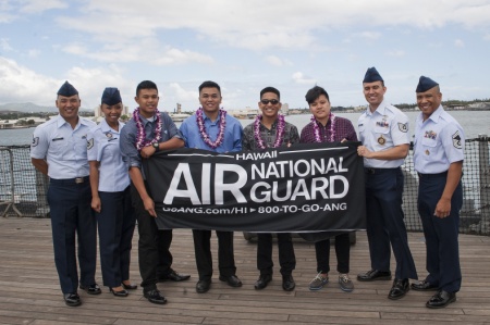 From left to right) Hawaii Air National Guard recruiters Tech. Sgt. Nolan Kaahanui, Tech. Sgt. Sharon Pasion, Tech Sgt. Todd Shak and Senior Master Sgt. Christophr Perez, pose for a group photo with Air National Guard enlistees (from left to right) Noel Antalan, Curtis Colipano Jr., Zane Toldeo and Trish Trafalgar, during the Inaugural Our Community Salutes (OCS) Recognition Ceremony at the USS Battleship Missouri Memorial May 17, 2015, on Ford Island, Joint Base Pearl Harbor-Hickam, in Hawaii. OCS of Hawaii is a community based initiative to recognize and honor graduating high school seniors, who plan to join the Armed Forces after graduation. One hundred and twenty high school graduates were recognized during the ceremony. (U.S. Air Force photo by Staff Sgt. Christopher Hubenthal)