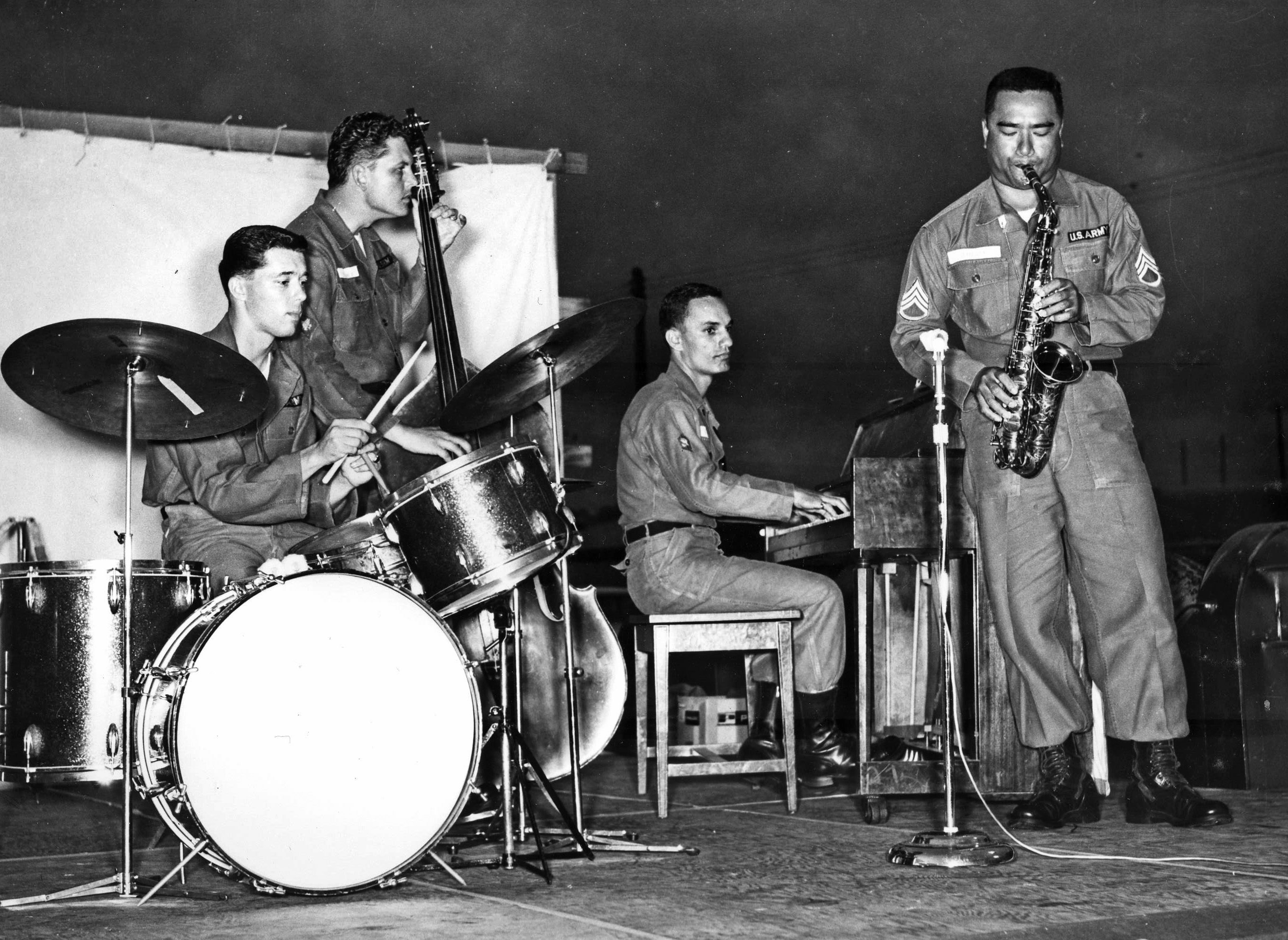 SPC Ronald E. Bright on keyboards with the 111th Army Band Combo. SSG James Ahloy on sax 