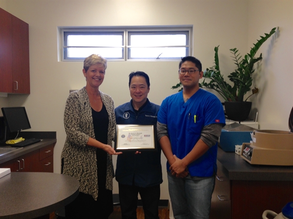 L-R: Bridget Komine, Dr. Darin K. Hisanaga and Spc. Dane Eguchi