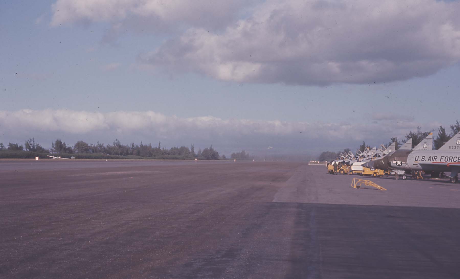 This photograph shows Dillingham Field in the middle 1960s. After the then-154th Fighter Interceptor Group converted to F-102 Delta Daggars in 1960, some of the annual summer camp training was done at Dillingham Field.