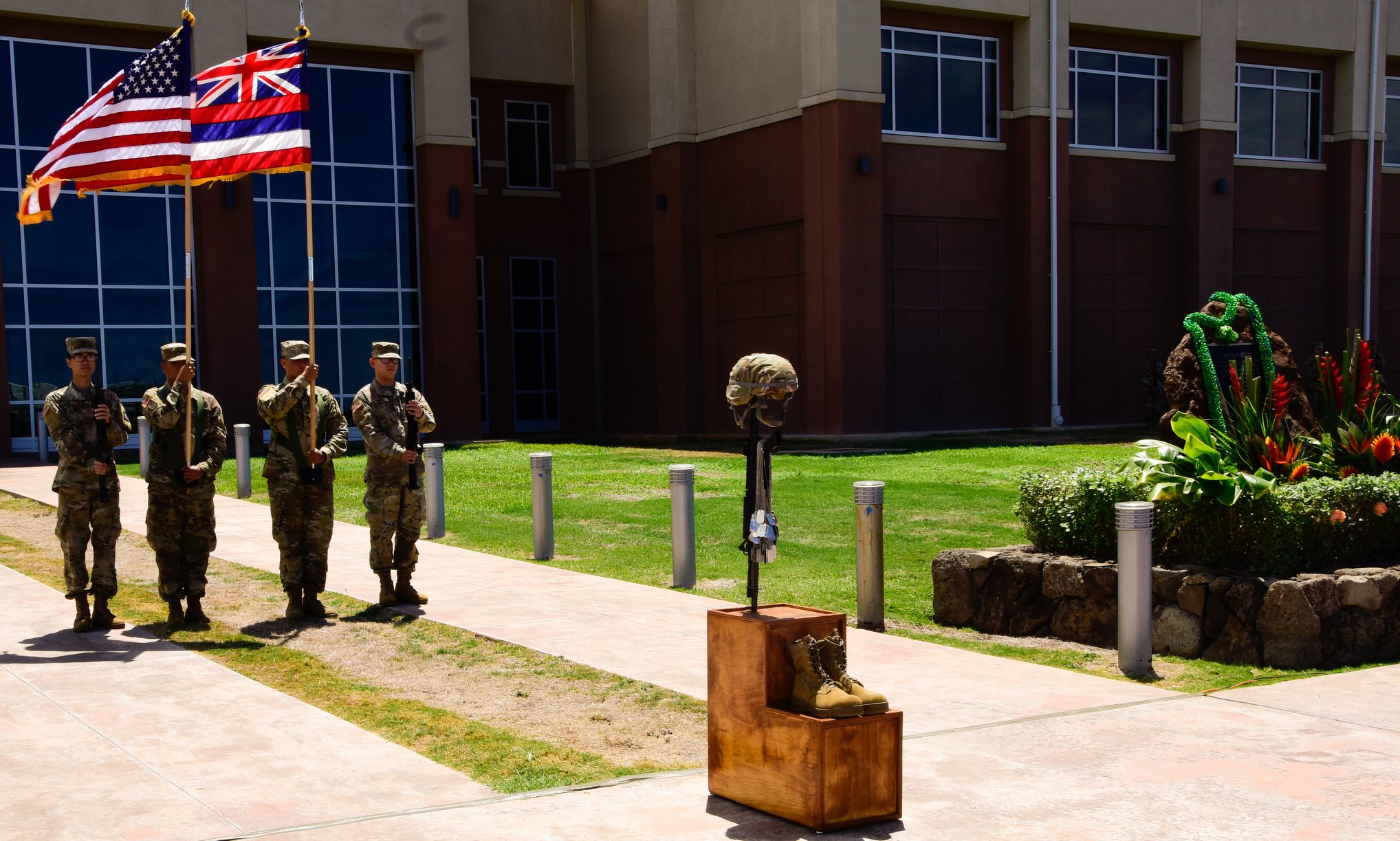 A combat helmet, rifle, boots and identification tags are displayed forming a battlefield cross during the 29th Infantry Brigade Combat Team ceremony honoring fallen Soldiers from Hawaii who made the ultimate sacrifice while serving in the Vietnam Conflict, Operation Iraqi Freedom and Operation Enduring Freedom during a memorial ceremony Kalaeloa, Hawaii, May 24, 2019.

