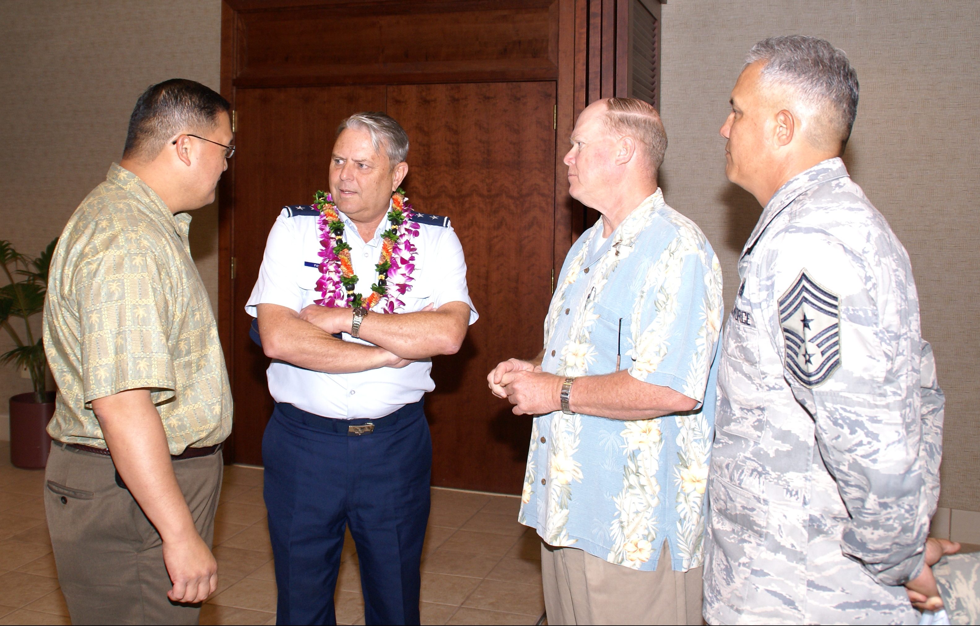 This photograph was taken on April 17, 2009 at the DOD Retirement and Awards Luncheon. Maj Gen Peter “Skipper” Pawling was one of the many retirees honored that day. In the photograph are (L-R): Ronald Han, Skipper, David “Snake” Snakenburg, and Robert “Rob” Lee.

