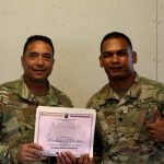 Senior enlisted advisor to the Commander of the Hawaii Army National Guard, Command Sgt. Maj. James R. Jimenez presents a certificate of achievement to SSG Matthan T. Uelese of 1st Battalion, 487th Field Artillery, for winning the Non-Commissioned Officer portion of 2020 Best Warrior Competition held at Schofield Barracks, Hawaii, on March 6-8, 2020. Uelese will represent the Hawaii Army National Guard at the Regional competition. (U.S. Army National Guard photo by SSG Thomas Foster)