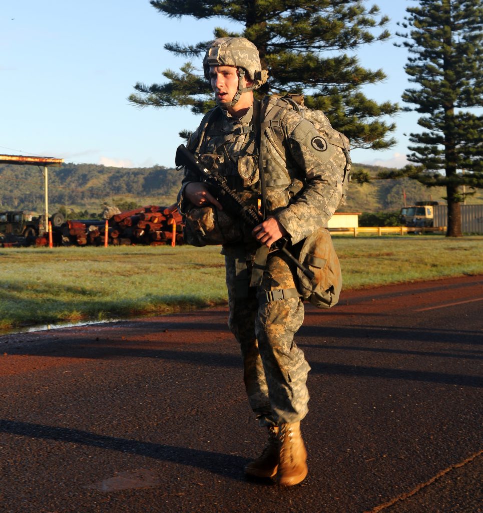 U.S. Army Spc. Paul Berzinas, assigned to the 117th Mobile Public Affairs Detachment, Hawaii Army National Guard, remains focused after passing the midway point of a twelve mile road march during the Hawaii best warrior competition March 5, 2017. The grueling three-day competition tested Soldiers on numerous warrior tasks, and included several events designed to test each Soldier’s mental and physical endurance. Spc. Berzinas’ performance during the competition earned him the title of the 2017 Hawaii Army National Guard Soldier of the year.