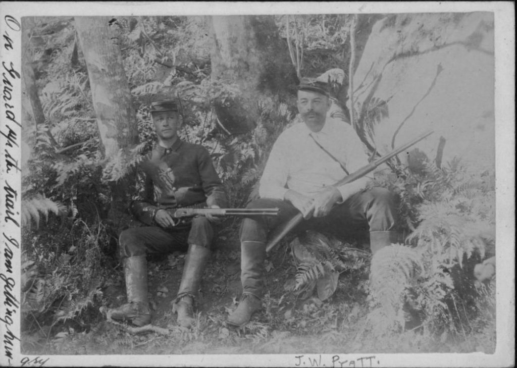 National Guardsmen guarding trail in Kalalau Valley, Kauai - J.W. Pratt on right during hunt for Koolau and others. Kaluaikoolau. a.k.a. Koolau the Leper