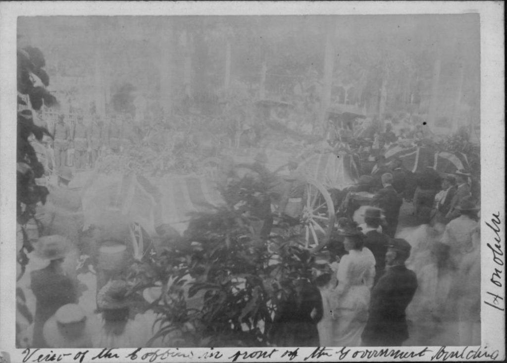Coffins of Deputy Sheriff Louis Stolz and Guardsmen at Executive Bldg., Honolulu. Shot during the hunt for Koolau and others in Kalalau Valley, Kauai. Kaluaikoolau. a.k.a. Koolau the Leper