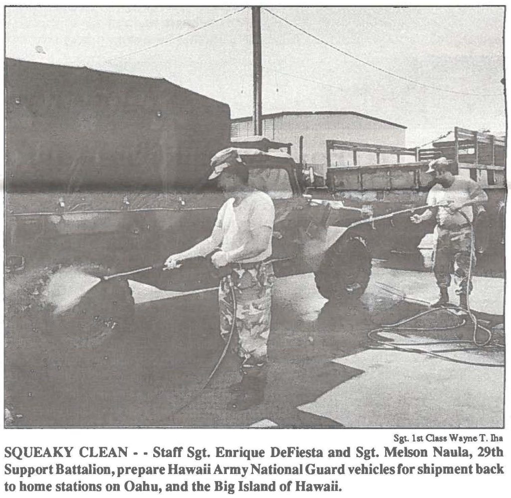 SQUEAKY CLEAN - - Staff Sgt. Enrique DeFiesta and Sgt. Melson Naula, 29th Support Battalion, prepare Hawaii Army National Guard vehicles for shipment back to home stations on Oahu, and the Big Island of Hawaii.