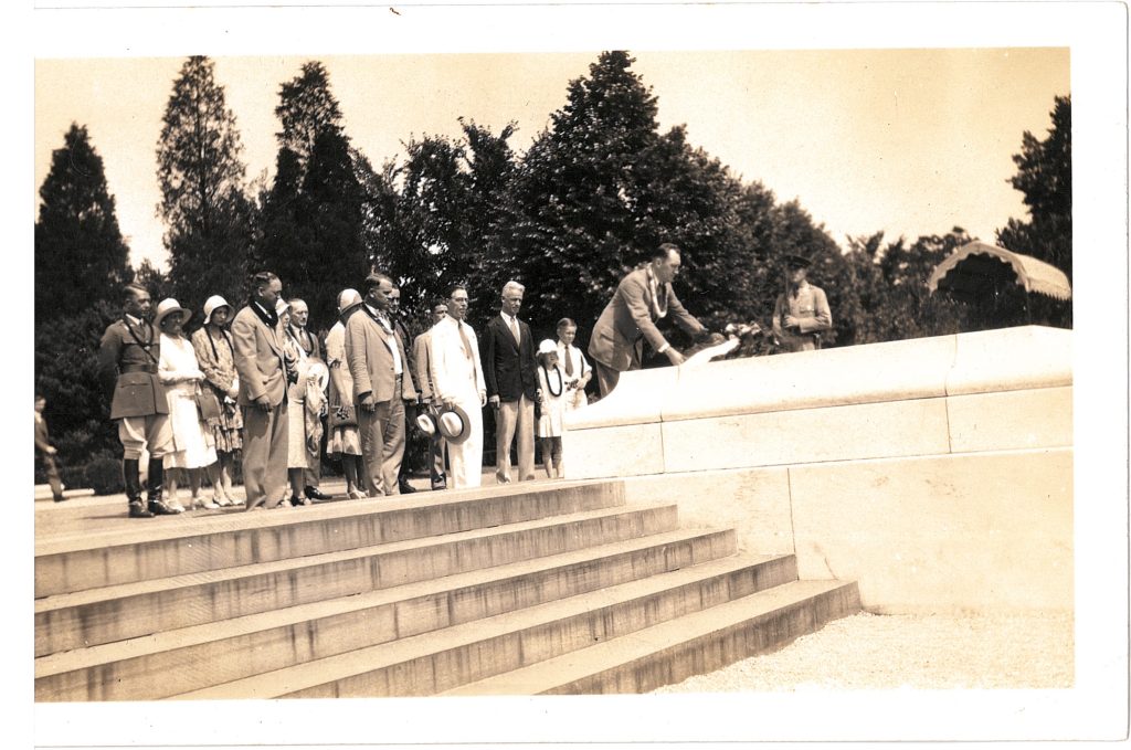 1930. Delegation from Hawaii placing wreath on tomb of “Unknown Soldier” Captain Mookini and delegate V. and K. Houston in foreground