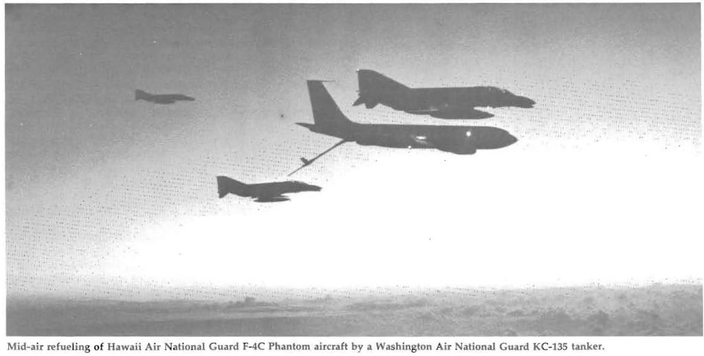 Mid-air refueling of Hawaii Air National Guard F-4C Phantom aircraft by a Washington Air National Guard KC-135 tanker.
