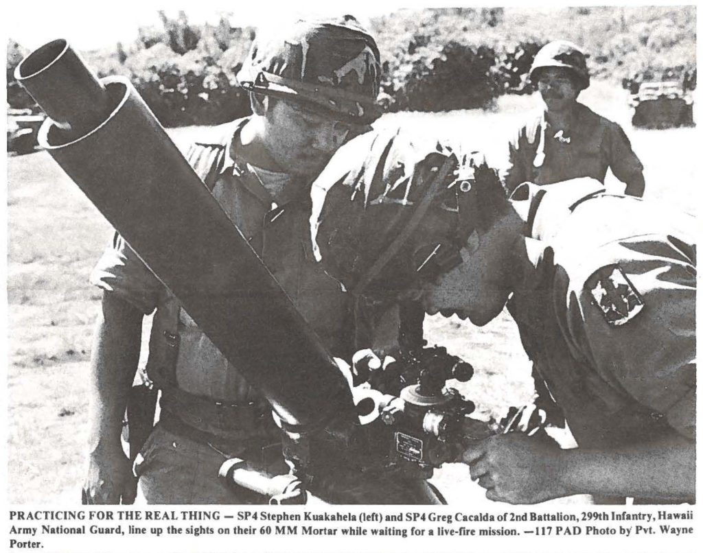 PRACTICING FOR THE REAL THING - SP4 Stephen Kuakahela (left) and SP4 Greg Cacalda or 2nd Battalion, 299th Infantry, Hawaii Army National Guard, line up the sights on their 60 MM Mortar while waiting for a live-fire mission. -117 PAD Photo by' Pvt. Wayne Porter.