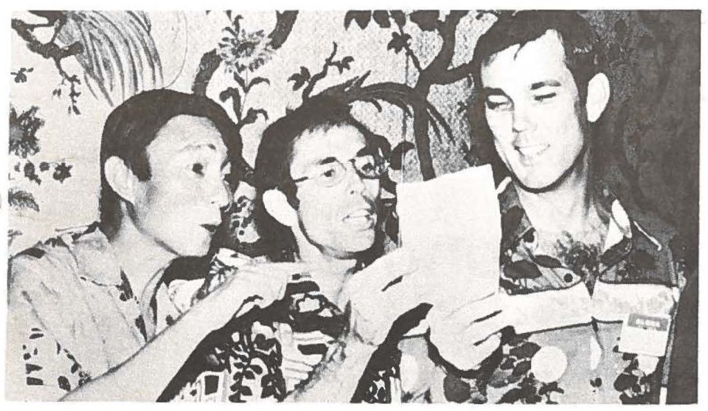 Lt. Col. (Dr.) James Gallup (center) of the 154th U.S. Air Force Clinic, Maj. Gerrit Osborne and a JASDF pilot join in singing "Aloha Oe" in Japanese.
