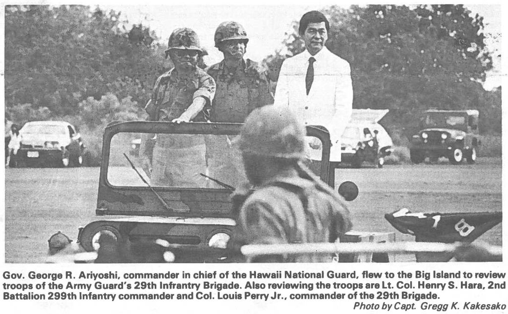 Gov. George R. Ariyoshi, commander in chief of the Hawaii National Guard, flew to the Big Island to review troops of the Army Guard's 29th infantry Brigade. Also reviewing the troops are Lt. Col. Henry S. Hara, 2nd Battalion 299th Infantry commander and Col. Louis Perry Jr., commander of the 29th Brigade. Photo by Capt. Gregg K. Kakesako