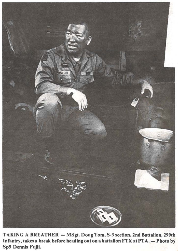 TAKING A BREATHER - MSgt. Doug Tom, S-3 section, 2nd Battalion, 299th Infantry, takes a break before heading out on a battalion FTX at PTA. - Photo by Sp5 Dennis Fujii.