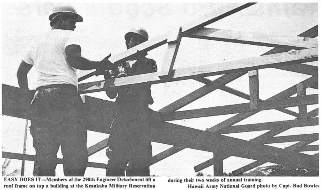 EASY DOES IT-Members of the 298th Engineer Detachment lift a roof frame on top a building at the Keaukaha Military Reservation during their two weeks of annual training. Hawaii Army National Guard photo by Capt. Bud Bowles