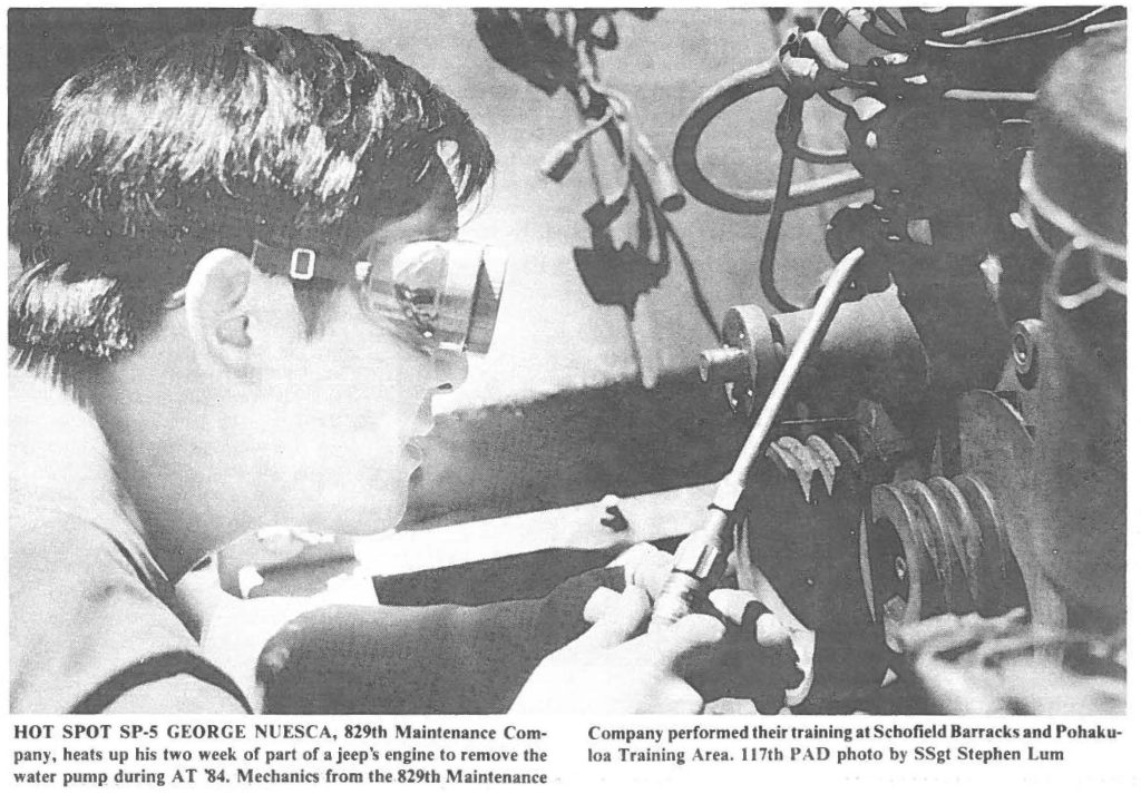 HOT SPOT SP-5 GEORGE NUESCA, 829th Maintenance Company, heats up his two week of part or II jeep's engine to remove the water pump during AT '84. Mechanics from the 829th Maintenance Company performed their training at Schofield Barracks and Pohakuloa Training Area. 117th PAD photo by SSgt Stephen Lum
