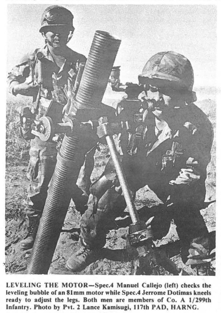 LEVELING THE MOTOR-Spec.4 Manuel Callejo (left) checks the leveling bubble or an 81 mm motor while Spec.4 Jerrome Doti mas kneels
ready to adjust the legs. Both men are members of Co. A 1/l99th Infantry. Photo by Pvt. 2 Lance Kamisugi, 117th PAD, HARNG.