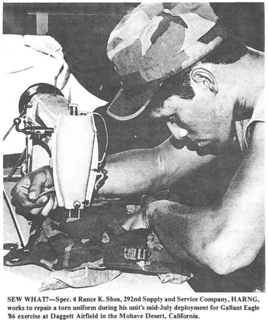 SEW WHAT?-Spec. 4 Rance K. Shea, 292nd Supply and Service Compan), HARNG, works to repair a torn uniform during his unit's mid-July deployment for Gallant Eagle '86 exercise at Daggett Airfield in the Mohave Desert. California.
