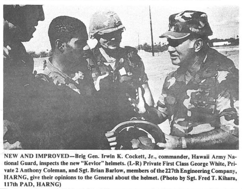 NEW AND IMPROVED-Brig Gen. Irwin K. Cockett, Jr., commander, Hawaii Army Nation.al Guard, inspects the new "Kevlor" helmets. (L-R) Private First Cius George White, Private 2 Anthony Coleman, and Sgt. Brian Barlow, members or the 227th Engineering Company, HARNG, give their opinions to the General about the helmet. (Photo by Sgt. Fred T. Kihan, 117th PAD, HARNG)