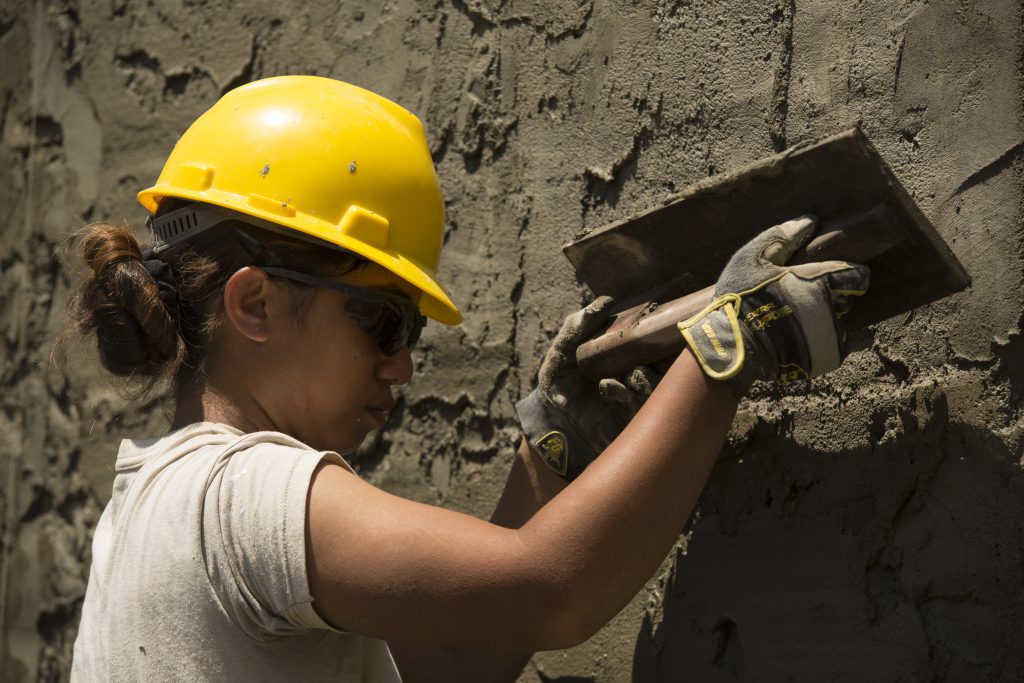 U.S. Army Sgt. Kilohana Abilay applies plaster to a school building at Duran Elementary School in Dumalag, Capiz, April 29, 2017 as part of a humanitarian civic action project for Balikatan 2017. Abilay is an interior electrician with 230th Engineer Company, Hawaii Army National Guard. Balikatan is an annual U.S.-Philippine bilateral military exercise focused on a variety of missions, including humanitarian assistance and disaster relief, counterterrorism, and other combined military operations. (U.S. Marine Corps photo by Lance Cpl. Nelson Duenas)