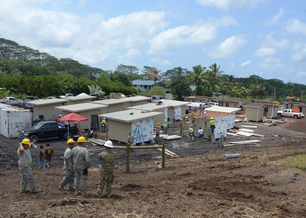 Engineers from the 230th Vertical Engineer Company, Hawaii National Guard, construct 20 microshelters in Pahoa, Hawaii, June 9, 2018. The project is community effort led by Hope Services Hawaii, a faith-based non-profit organization. (Air National Guard photo by Master Sgt. Chris Schepers)