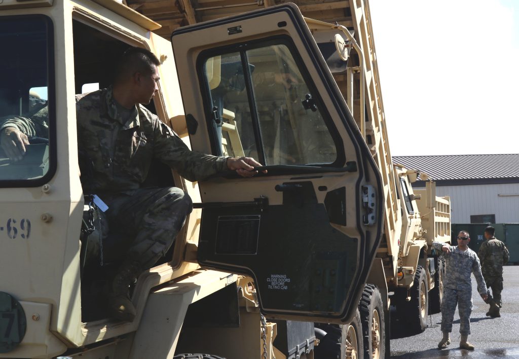 Soldiers from the 230th Engineer Company perform preventative maintenance and checks on vehicles in Kahului, Hawaii on September 11, 2018. Hawaii National Guard Soldiers and Airmen throughout the State are preparing to respond to Hurricane Olivia’s high winds and heavy rains, which are expected to begin impacting the State in the evening hours of September 11, 2018. (U.S. Army National Guard photo by Staff Sgt. Christopher Martens)