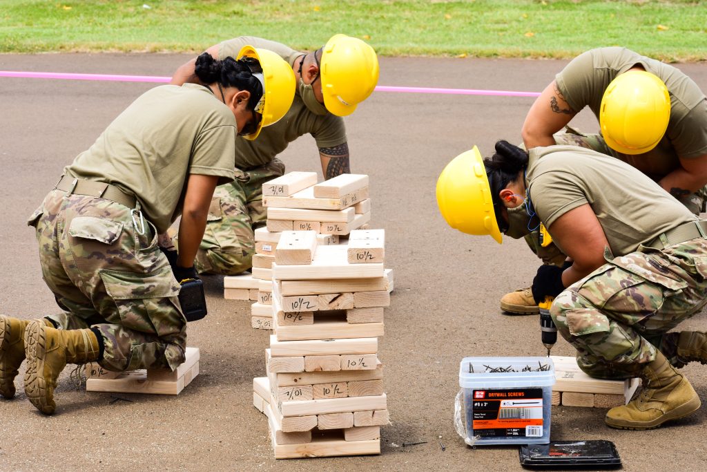 Hawaii Army National Guard Soldiers with 230th Engineer Company, 103rd Troop Command, utilize their skills to construct platforms that will help Maui county residents during the COVID-19 pandemic, Kihei, Hawaii, April 25, 2020. (U.S. Army National Guard photo by Sgt. 1st Class Theresa Gualdarama)