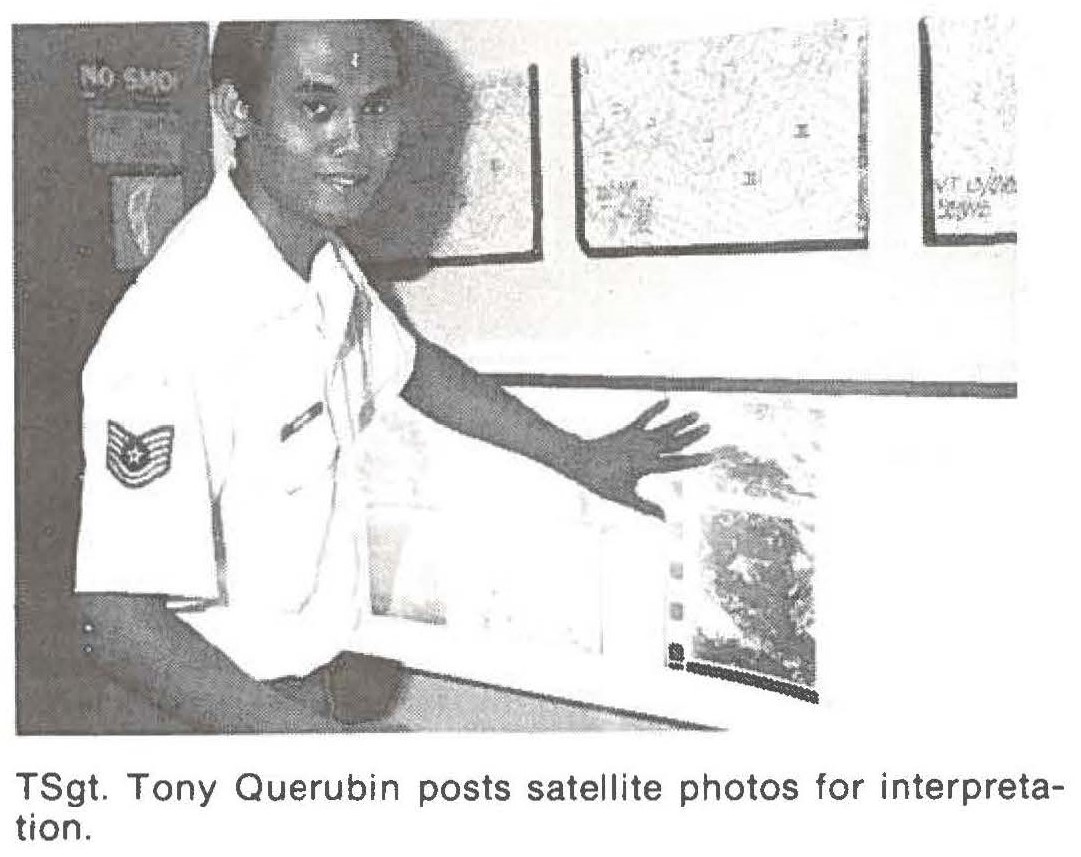 TSgt. Tony Querubin posts satellite photos for interpretation.