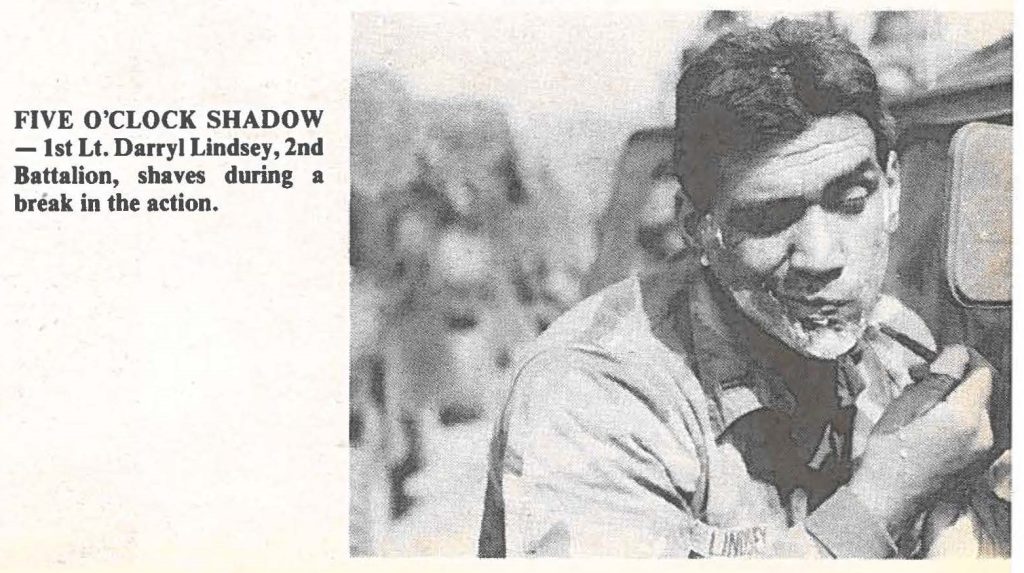 FIVE O'CLOCK SHADOW -1st Lt. Darryl Lindsey, 2nd Battalion, shaves during a break in the action.
