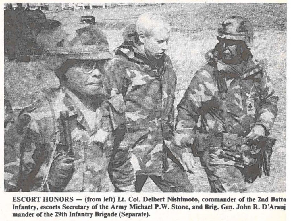 ESCORT HONORS - (from left) Lt. Col. Delbert Nishimoto, commander of the 2nd Battalion Infantry, escorts Secretary of the Army Michael P.W. Stone, and Brig. Gen. John R. D'Arauj commander of the 29th Infantry Brigade (Separate).
