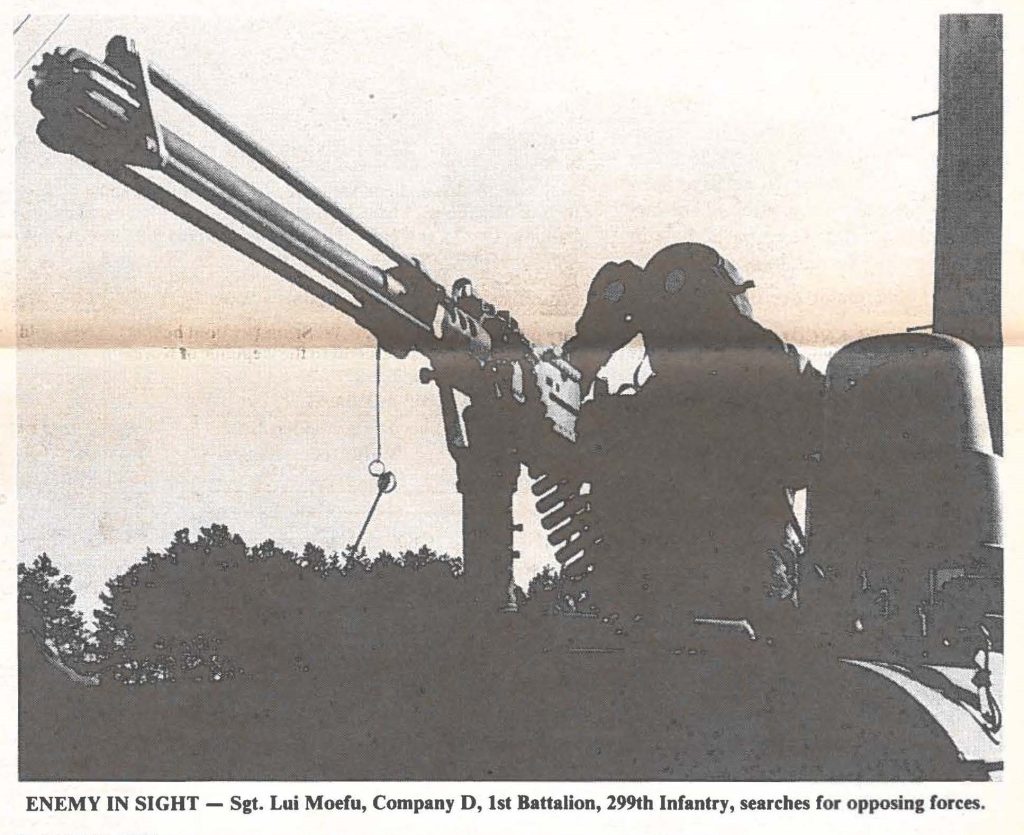 ENEMY IN SIGHT - Sgt. Lui Moefu, Company D, 1st Battalion, 299th Infantry, searches for opposing forces.