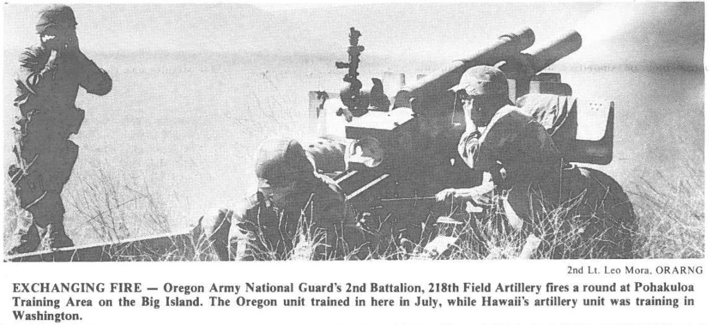 EXCHANGING FIRE - Oregon Army National Guard's 2nd Battalion, 218th Field Artillery fires a round at Pohakuloa Training Area on the Big Island. The Oregon unit trained in here in July, while Hawaii's artillery unit was training in Washington.