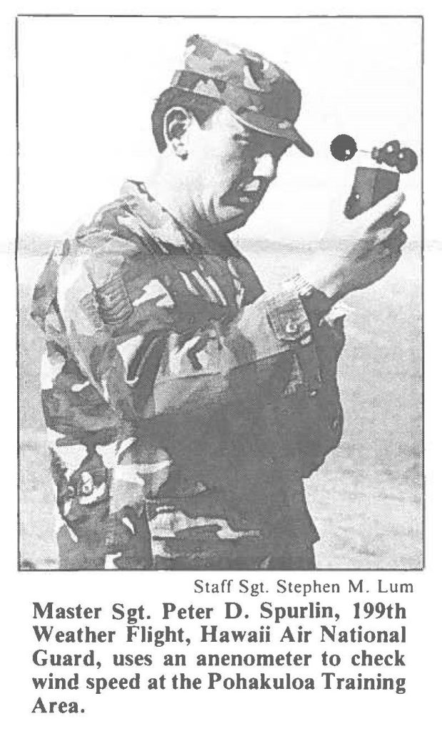 Master Sgt. Peter D. Spurlin, 199th Weather Flight, Hawaii Air National Guard, uses an anenometer to check wind speed at the Pohakuloa Training Area.