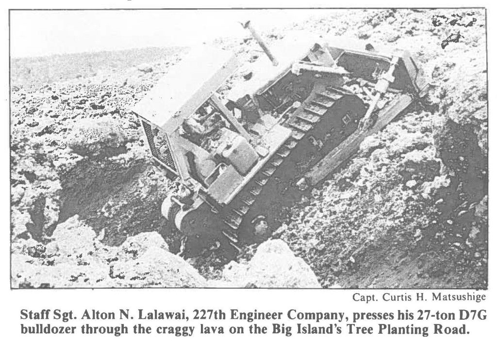Staff Sgt. Alton N. Lalawai, 227th Engineer Company, presses his 27-ton D7G bulldozer through the craggy lava on the Big Island's Tree Planting Road.