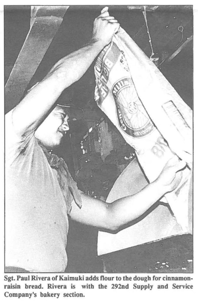 Sgt. Paul Rivera of Kaimuki adds flour to the dough for cinnamon-raisin bread. Rivera is with the 292nd Supply and Service Company's bakery section.