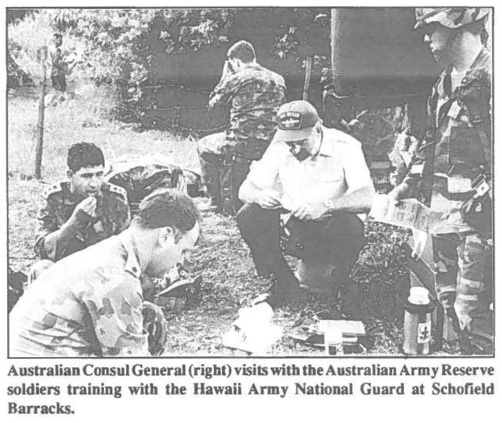 Australian Consul General (right) visits with the Australian Army Reserve soldiers training with the Hawaii Army National Guard at Schofield Barracks. 