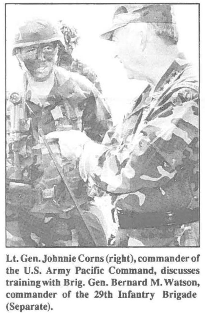 Lt. Gen. Johnnie Corns (right), commander of the U.S. Army Pacific Command, discusses training with Brig. Gen. Bernard M. Watson, commander or the 29th Infantry Brigade (Separate).