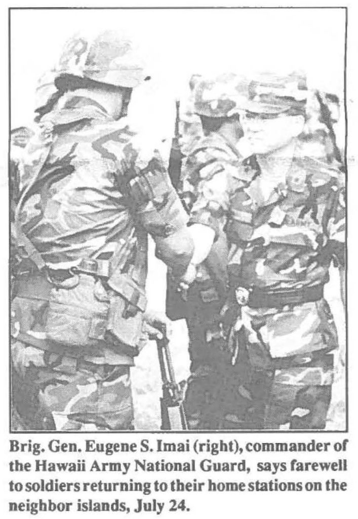 Brig. Gen. Eugene S. Imai (right), commander or the Hawaii Army National Guard, says farewell to soldiers returning to their home stations on the neighbor islands, July 24.