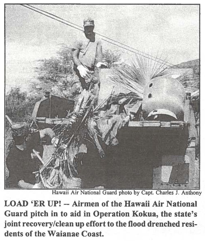 LOAD 'ER UP! - Airmen of the Hawaii Air National Guard pitch in to aid in Operation Kokua, the state's joint recovery/clean up effort to the flood drenched residents of the Waianae Coast