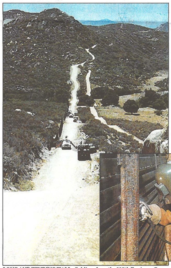 LONG AND WINDING WALL - Soldiers from the 227th Engineer Company (Combat) construct a 10-foot tall fence along the California-Mexico border. The engineers, from Oahu and the Big Island of Hawaii, welded "old" prefabricated Navy steel landing mats.