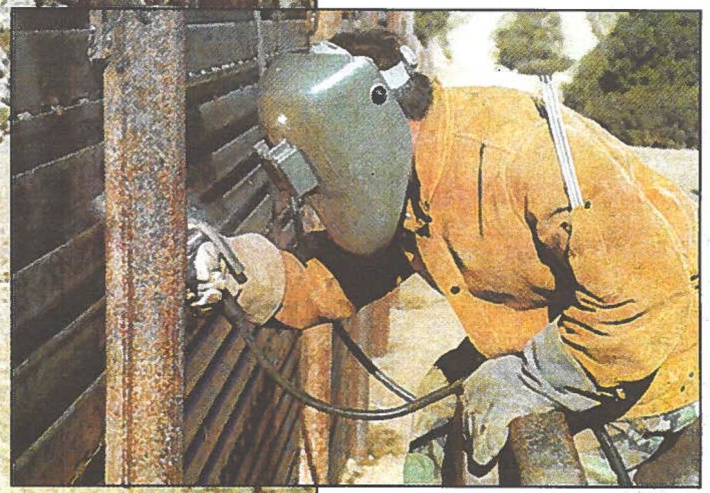 LONG AND WINDING WALL - Soldiers from the 227th Engineer Company (Combat) construct a 10-foot tall fence along the California-Mexico border. The engineers, from Oahu and the Big Island of Hawaii, welded "old" prefabricated Navy steel landing mats.
