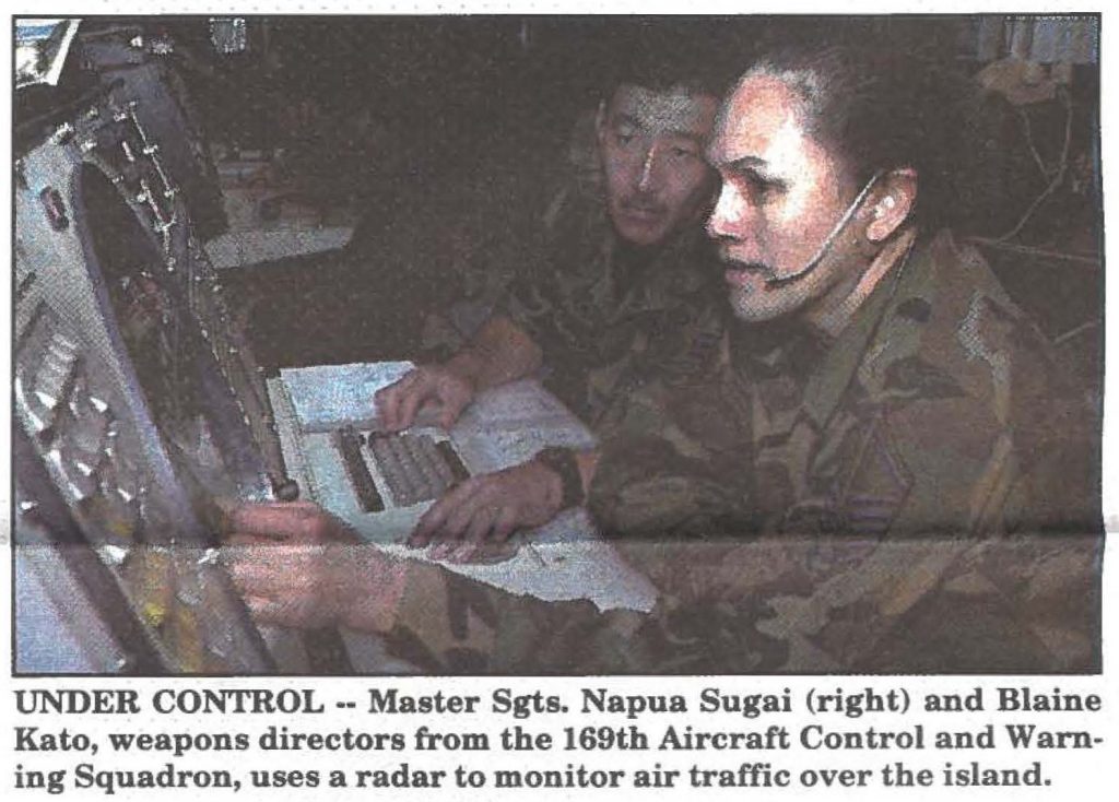 UNDER CONTROL .. Master Sgts. Napua Sugai (right) and Blaine Kato, weapons directors from the 169th Aircraft Control and Warning Squadron, uses a radar to monitor air traffic over the island.