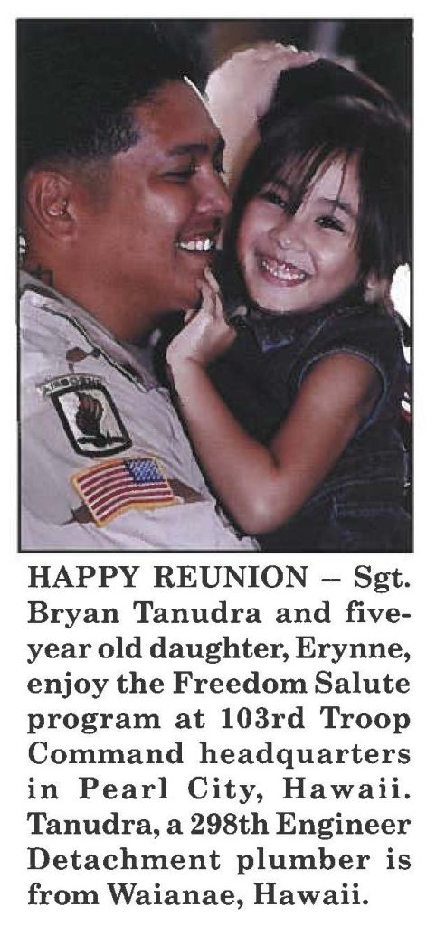 HAPPY REUNION - Sgt. Bryan Tanudra and five-year old daughter, Erynne, enjoy the Freedom Salute program at 103rd Troop Command headquarters in Pearl City, Hawaii. Tanudra, a 298th Engineer Detachment plumber is from Waianae, Hawaii.