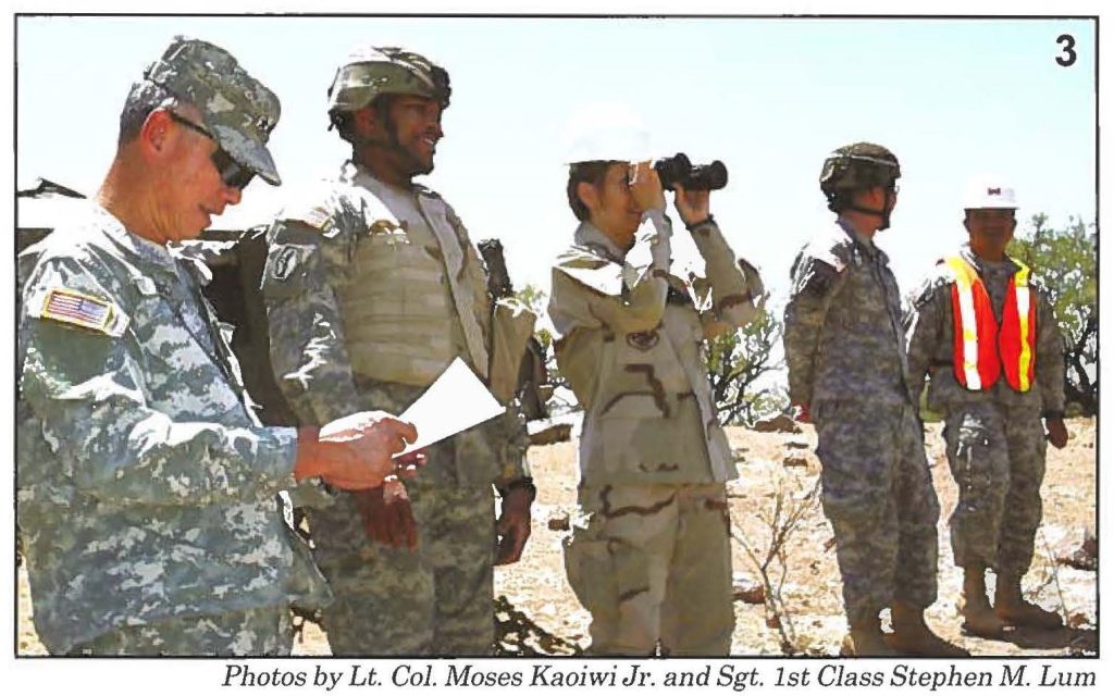 Maj. Gen. Robert G.F. Lee, the adjutant general (left) and State Command Chief Master Sgt. Denise M. Jelinski-Hall (with binoculars) check out the Hawaii Army National Guard rotation at Operation JUMP START in Arizona.