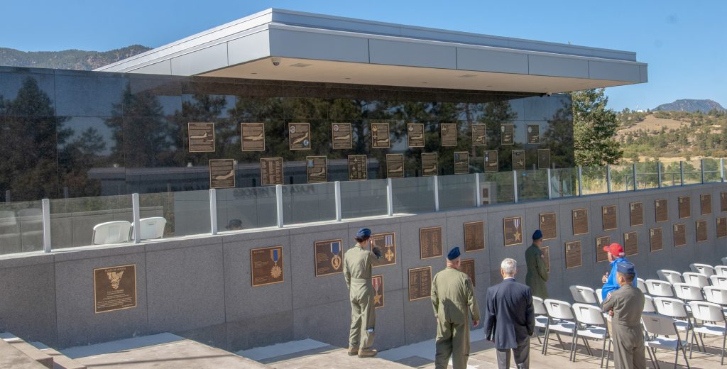 Hawaii Air National Guard airmen receive a tour of the Southeast Asia Plaza of Heroes memorial located at the U.S. Air Force Academy, Colorado Springs, CO, Oct. 2, 2019. The HIANG team had just completed a flyover above the memorial as part of a plaque dedication ceremony to honor the contributions of U.S. Air Force graduates who served as KC-135 Stratotanker crew members in the Vietnam War. (U.S. Air National Guard photo by Senior Airman Orlando Corpuz)