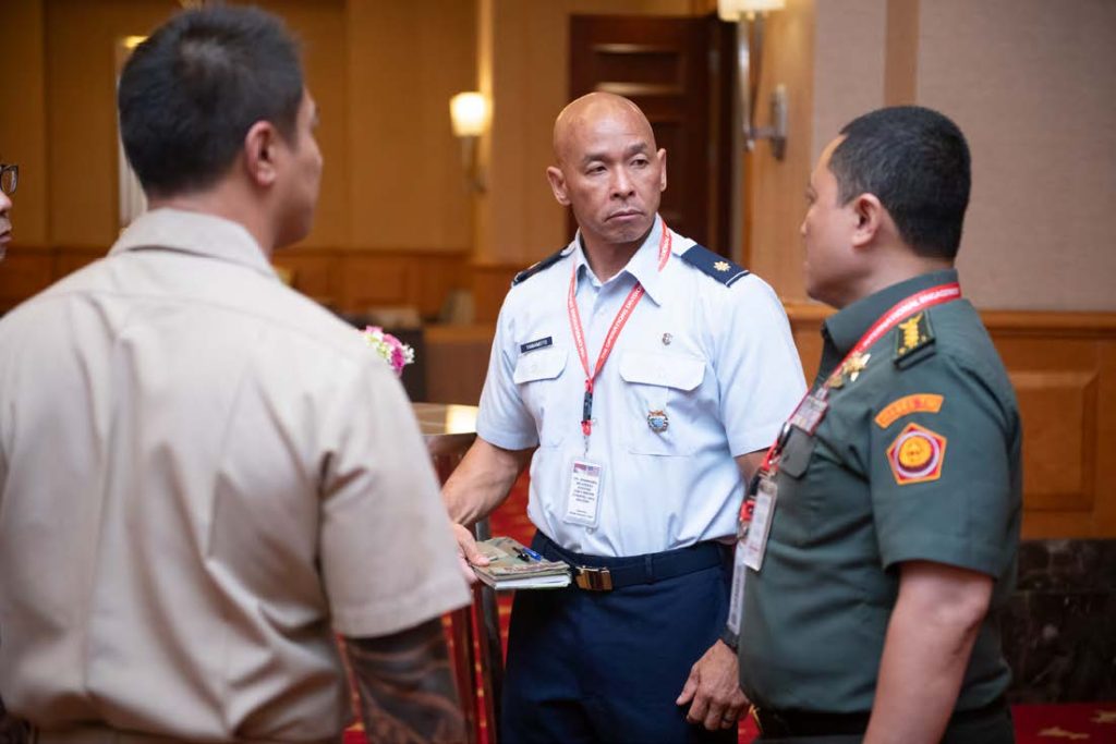 Tentara Nasional Indonesia leaders of the 2025 Bilateral Defense Discussions, Col. Arief Budiman, Maj. Gen. Gabriel Lema, S.SOS, and their equivalent counterparts from U.S. Indo-Pacific Command, U.S. Marine Corps Maj. Gen. Jay Bargeron and Brandon Torres, present the minutes collected throughout the event on Jan. 24, 2025, in Jakarta, Indonesia. The finalized documents reflect key agreements on interoperability, training exchanges, and long-term strategic cooperation between the two nations. (U.S. Air National Guard photo by Tech. Sgt. John Linzmeier)