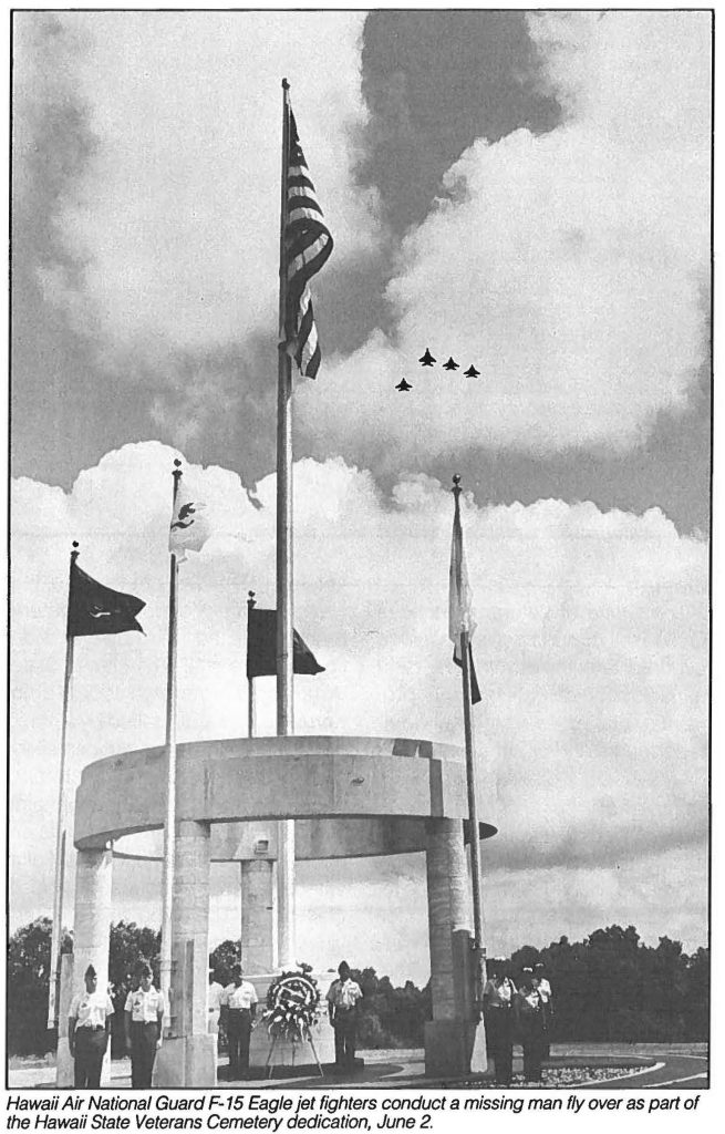 Hawaii Air National Guard F-15 Eagle jet fighters conduct a missing man fly over as part of the Hawaii State Veterans Cemetery dedication, June 2.