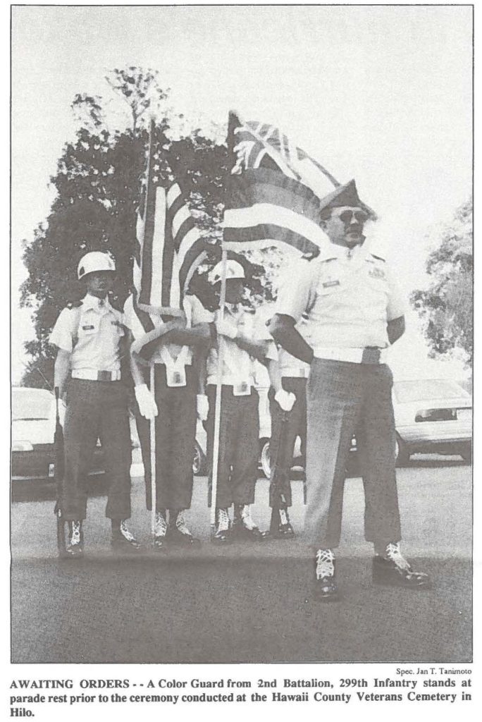 AW AlTING ORDERS •• A Color Guard from 2nd Battalion, 299th Infantry stands at parade rest prior to the ceremony conducted at the Hawaii County Veterans Cemetery in Hilo.